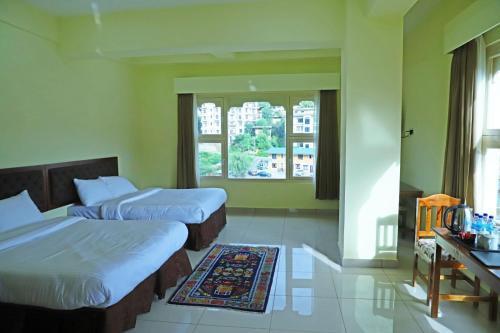 Hotel Bhutan Kubera - Tap to explore photos