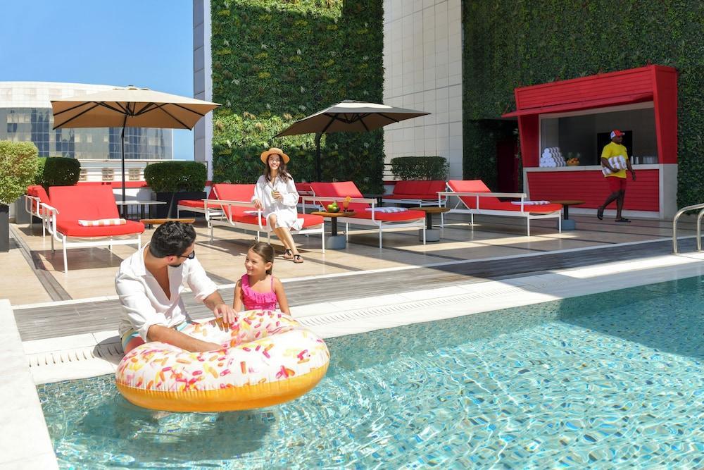Dusit Doha Hotel - Tap to explore photos