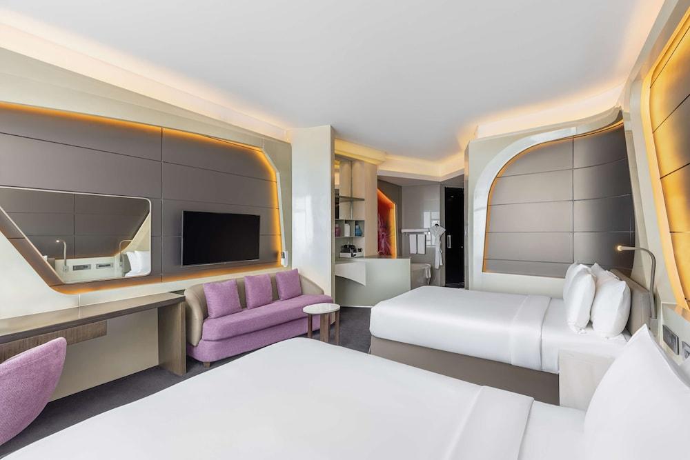 V Hotel Dubai, Curio Collection by Hilton Room Type - TWO QUEEN BEDS DELUXE ROOM