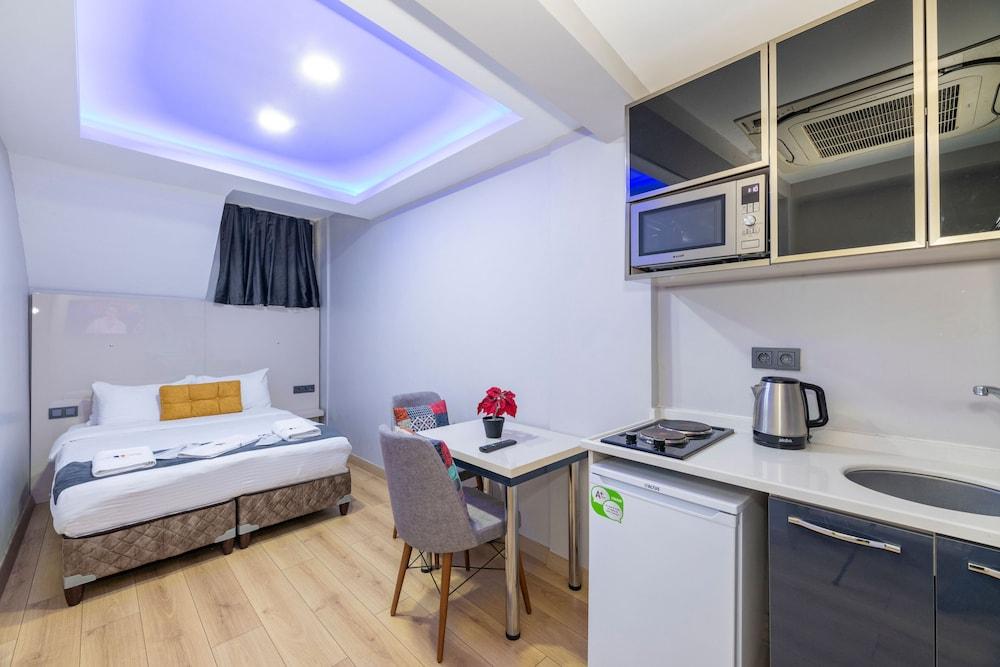 Butterfly Suites Room Type - A) Economic Basement Room