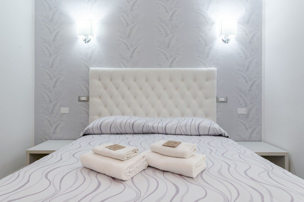 Brancaccio Luxury Suites - Tap to explore photos