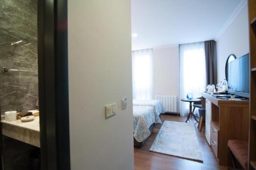 Nomade Hotel Exclusive Room Type - Deluxe Quadruple Room Nomade Hotel Exclusive Room Type - Deluxe Quadruple Room