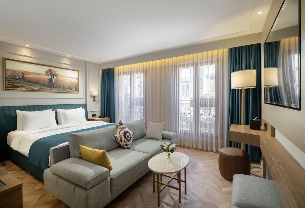 Royan Suites - Tap to explore photos