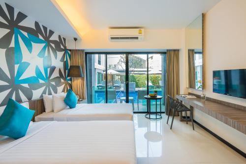 Hotel J Residence, Pattaya - Tap to explore photos