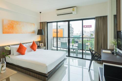 Hotel J Residence, Pattaya - Tap to explore photos