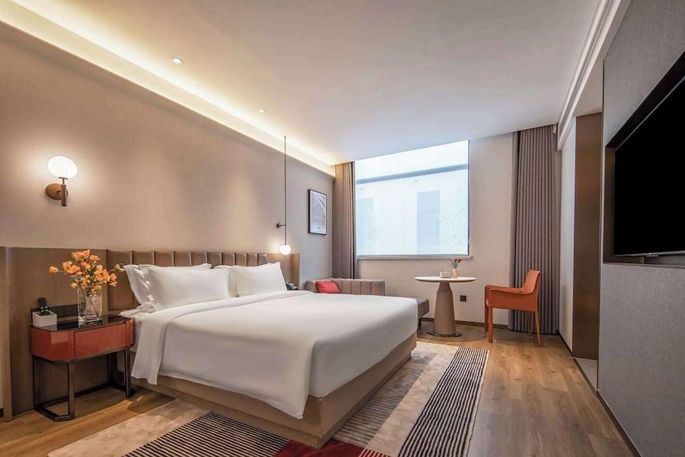 Ramada Encore by Wyndham Shanghai Pudong Airport - Tap to explore photos