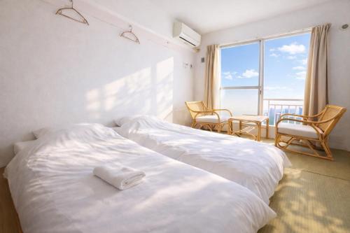 Sakura Hotel Nippori Room Type - Japanese style twin room with shared bath room Sakura Hotel Nippori Room Type - Japanese style twin room with shared bath room