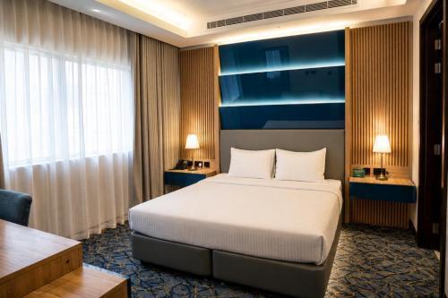 Al Mansour Suites Hotel - Tap to explore photos
