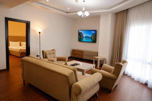Al Mansour Park-Inn Hotel & Apartments Room Type - Deluxe One-Bedroom Apartment Al Mansour Park-Inn Hotel & Apartments Room Type - Deluxe One-Bedroom Apartment