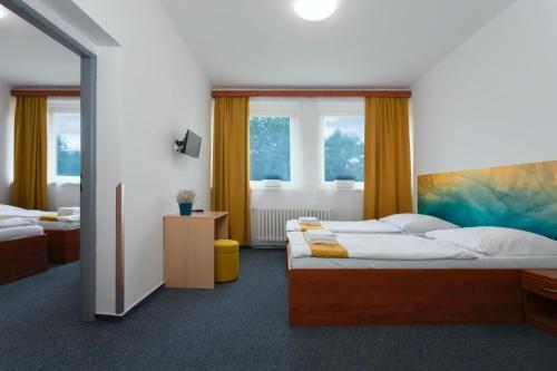 Hotel AMITY Room Type - Family Room with Private Bathroom Hotel AMITY Room Type - Family Room with Private Bathroom
