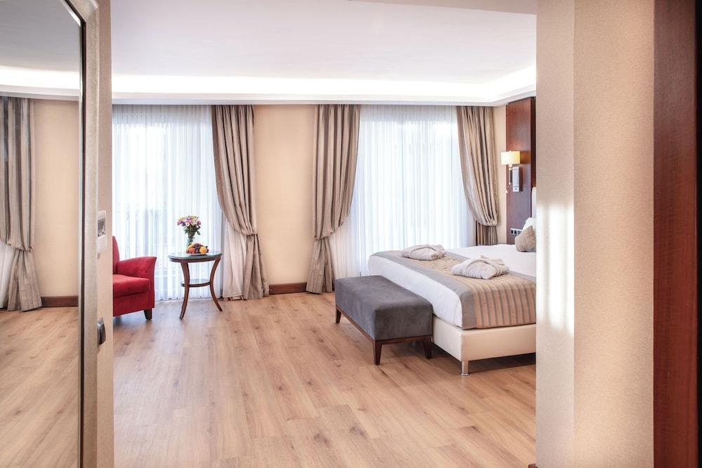Grand Aras Hotel & Suites - Tap to explore photos