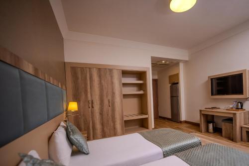Mari Suites Hotel - Tap to explore photos