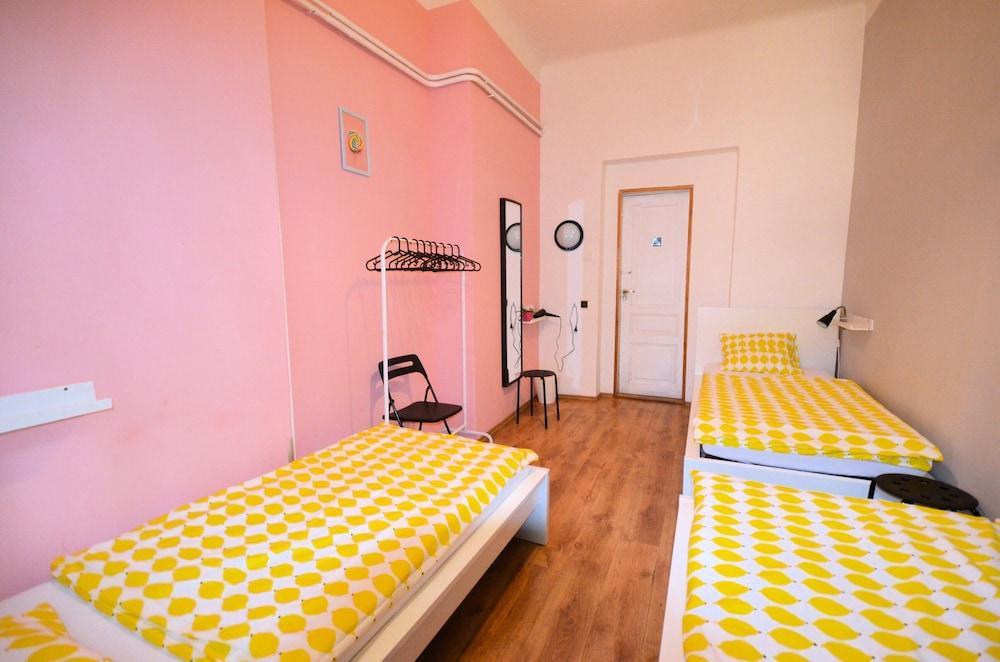 Travel & Joy backpackers Room Type - Classic Triple Room, 3 Twin Beds, Courtyard View (209)