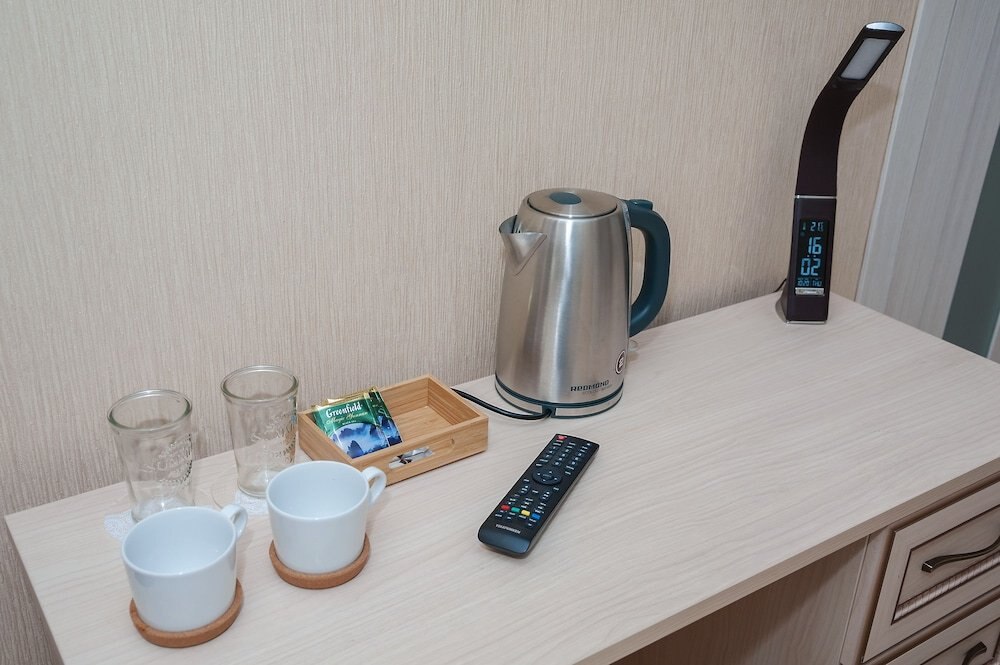 GloryVell Hotel - Tap to explore photos