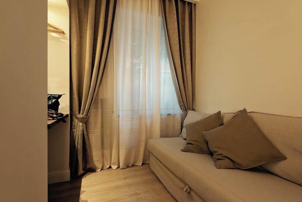 Aruna Suites - Tap to explore photos