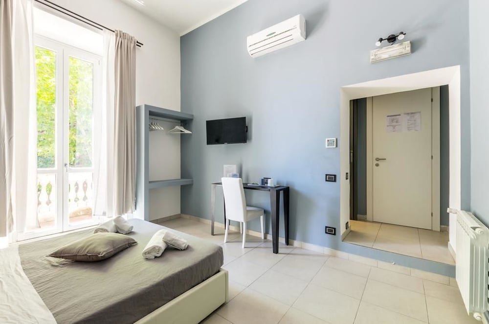 Merulana 139 Suites Room Type - Basic Triple Room, Balcony