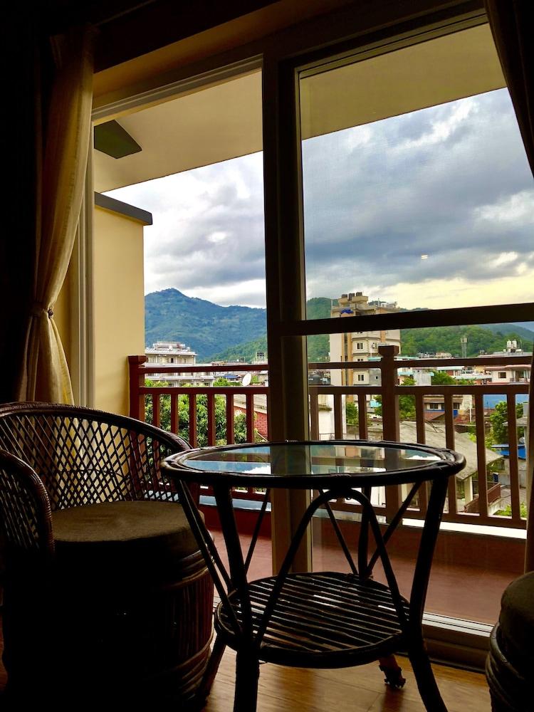 Om Gaura Hotel - Tap to explore photos