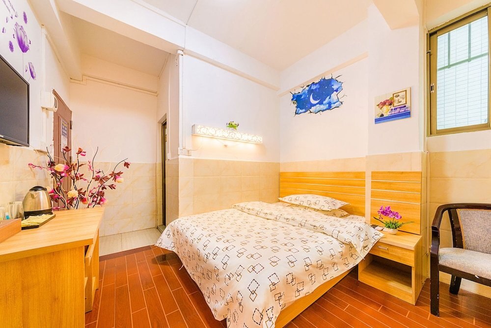 Wutongyu Hotel Apartment - Tap to explore photos