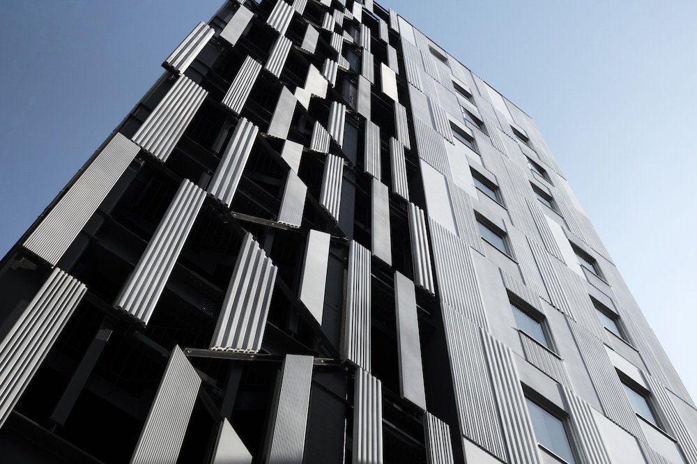 Hotel Comfact - Tap to explore photos