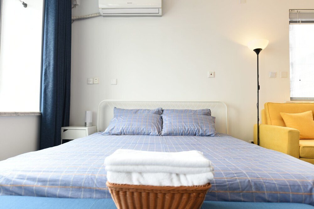Your Saint Land Service Apartment - Tap to explore photos