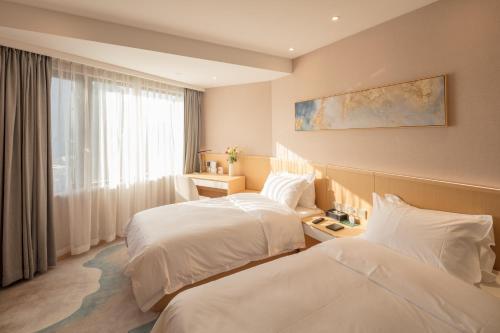 City Hotel Shanghai Room Type - Deluxe Double or Twin Room City Hotel Shanghai Room Type - Deluxe Double or Twin Room