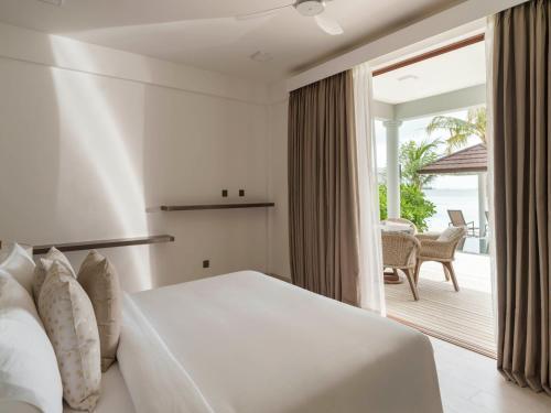 Sun Siyam Olhuveli Room Type - Two Bedroom Beach Residence (2 storey) - 50% Discount on Return Airport transfers, Free one-hour SPA