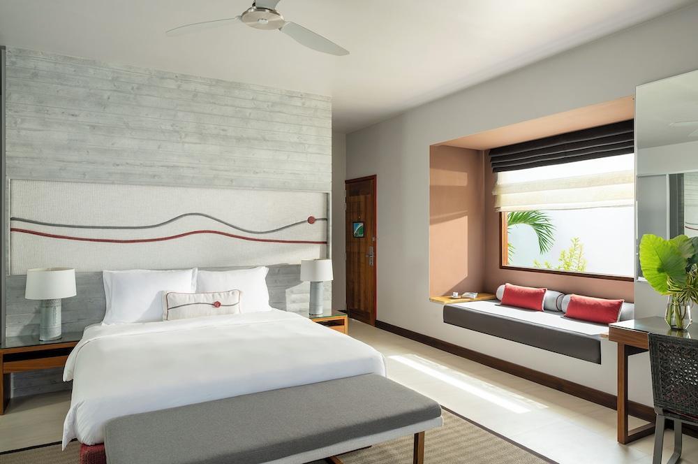 Dhigali Maldives - A Premium All-Inclusive Resort - Tap to explore photos