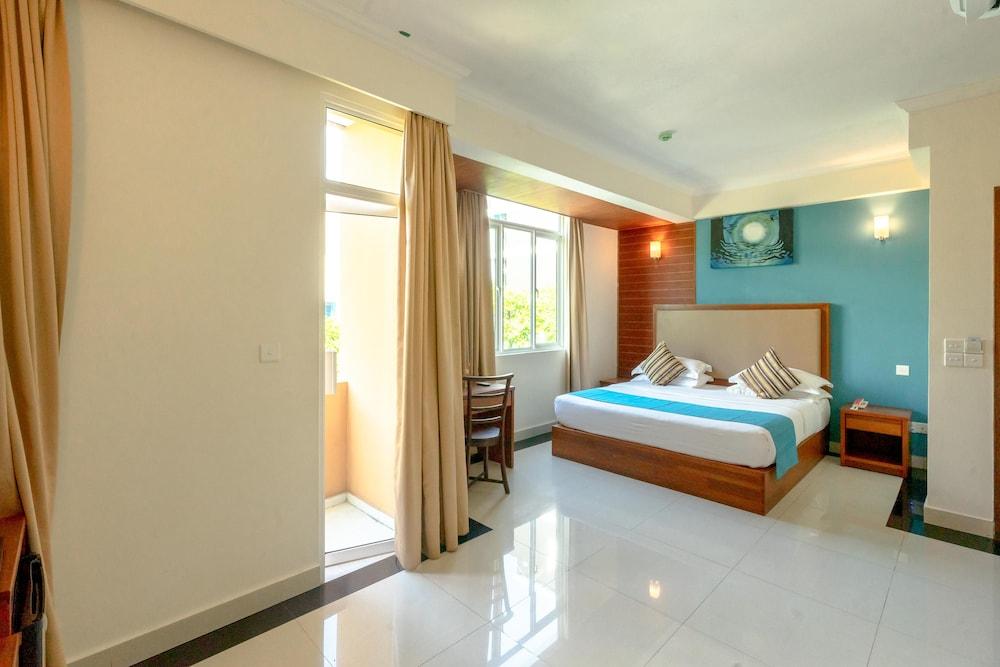 Noomoo Room Type - Deluxe Double Room with Balcony and Parital View