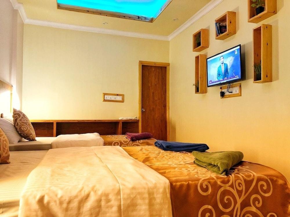 Mariana Inn Maldives Room Type - Deluxe Triple Room