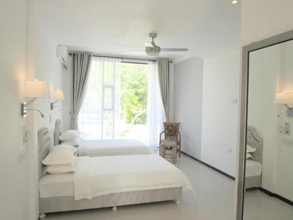 Nazaki Beach Hotel Maldives Room Type - Deluxe Room, 1 Bedroom, Private Bathroom, Beachside