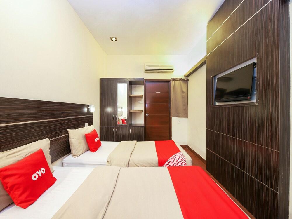 OYO 108 Golden Palace Hotel - Tap to explore photos