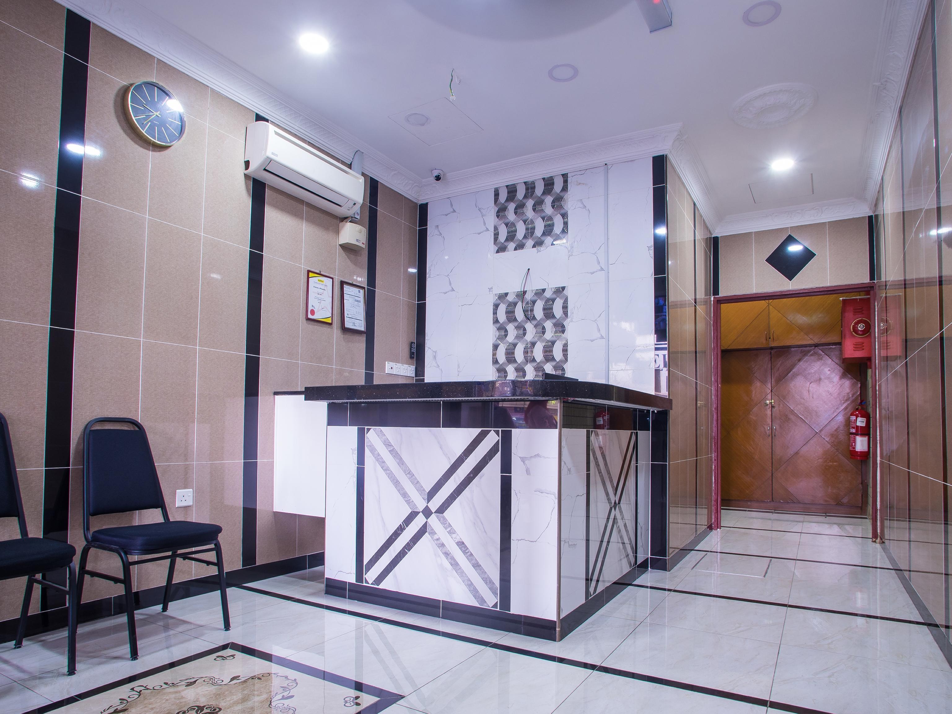 OYO 44015 MK Inn Hotel - Tap to explore photos