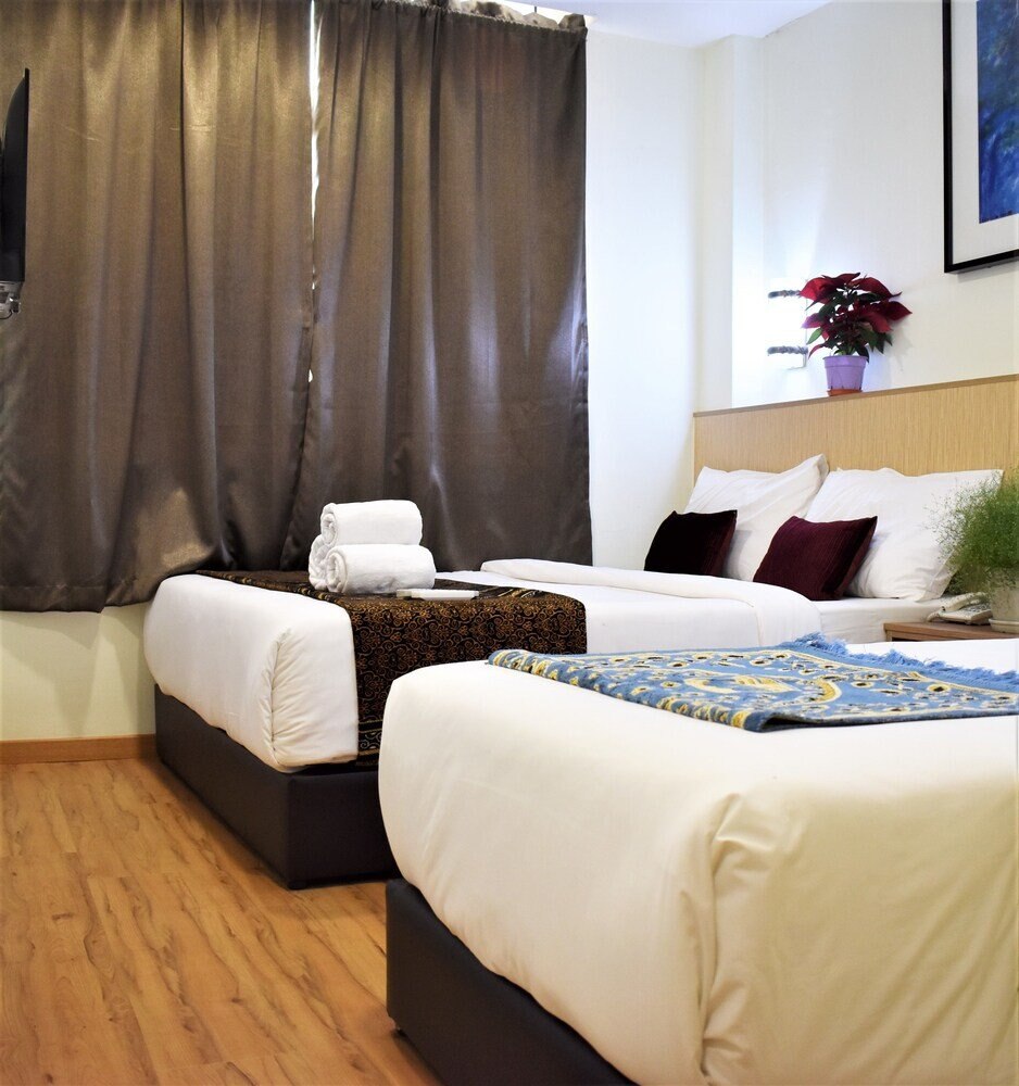 ECO Hotel at  Bukit Bintang Room Type - Deluxe Triple Room