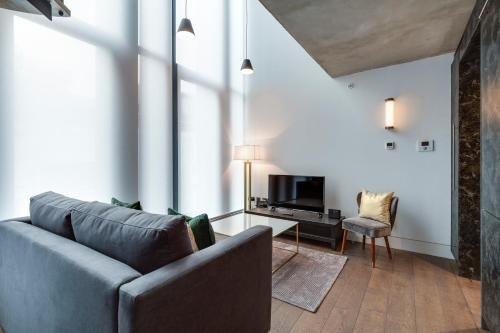 Soho Lofts by Aeria Apartments - Tap to explore photos