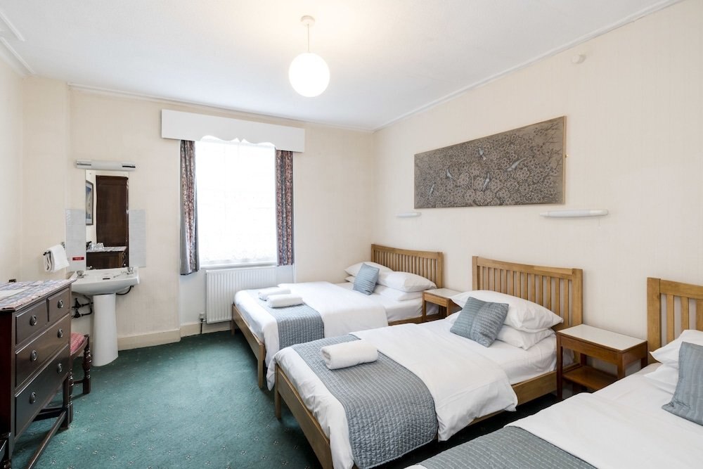 St Athans Hotel Room Type - Double and single room with private bathroom St Athans Hotel Room Type - Double and single room with private bathroom