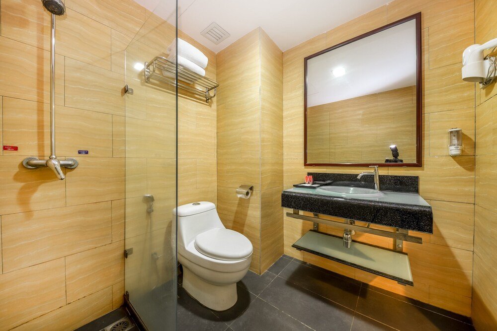 OYO Capital O 89357 Unicorn Hotel - Tap to explore photos