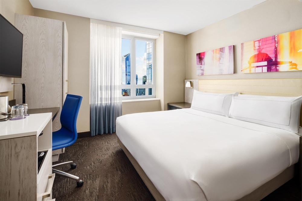 DoubleTree by Hilton Hotel New York Times Square West - Tap to explore photos