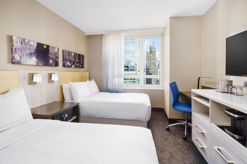 DoubleTree by Hilton Hotel New York Times Square West - Tap to explore photos