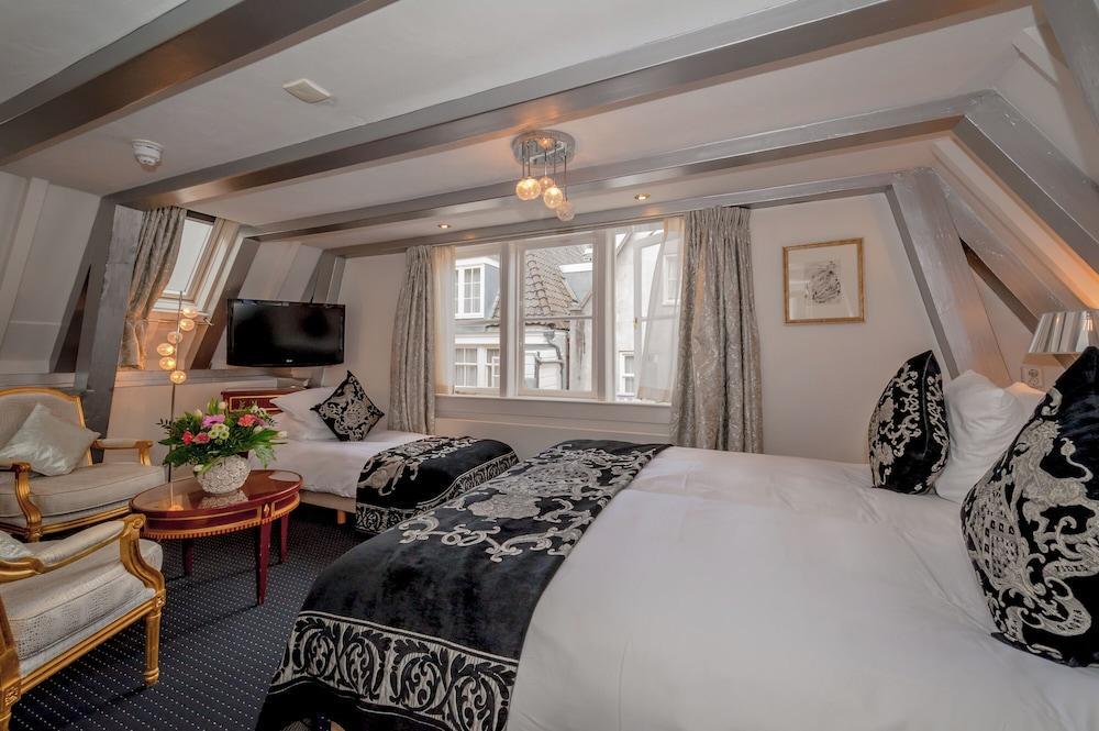 Ambassade Hotel Room Type - Classic Triple Room