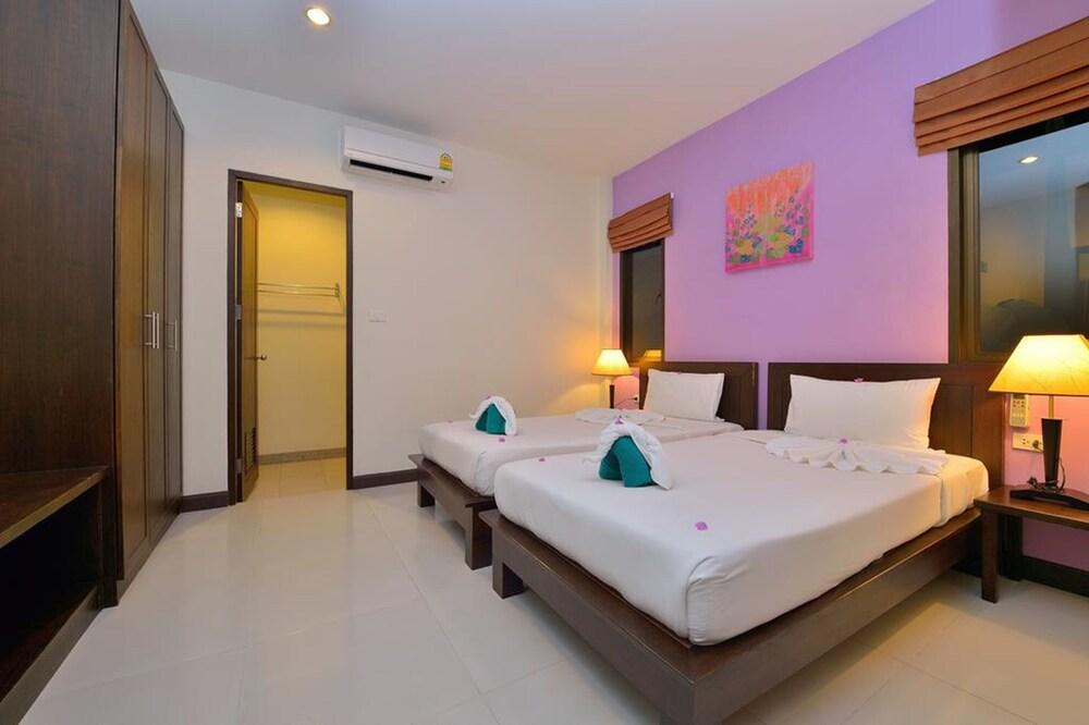 Happy Cottages Phuket - Tap to explore photos