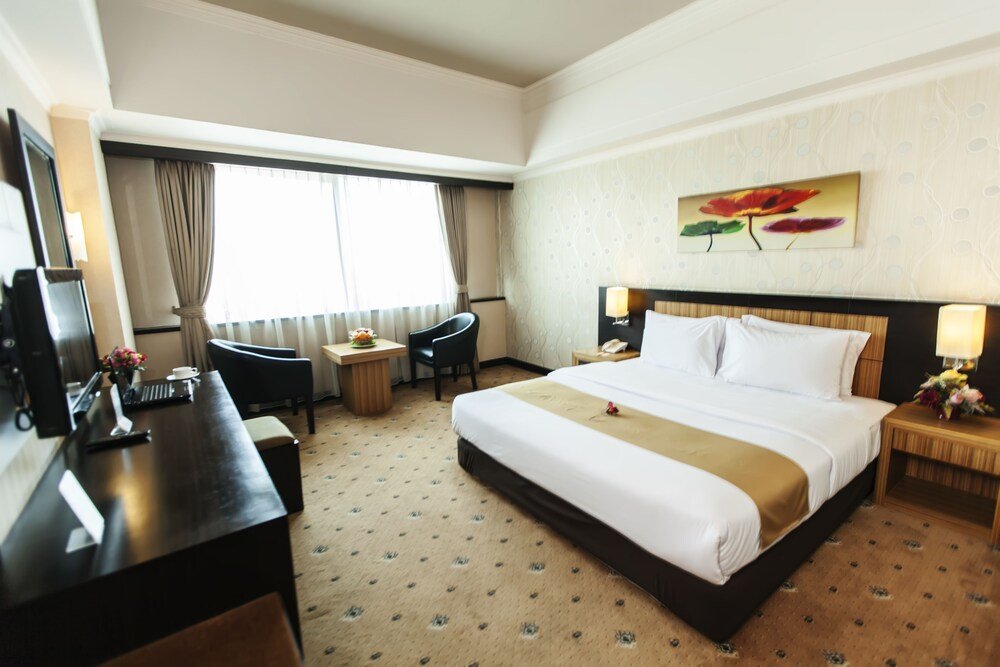 Hotel Orchardz Jayakarta - Tap to explore photos