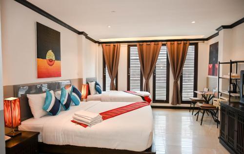Queen Boutique Hotel Room Type - Deluxe Triple Room