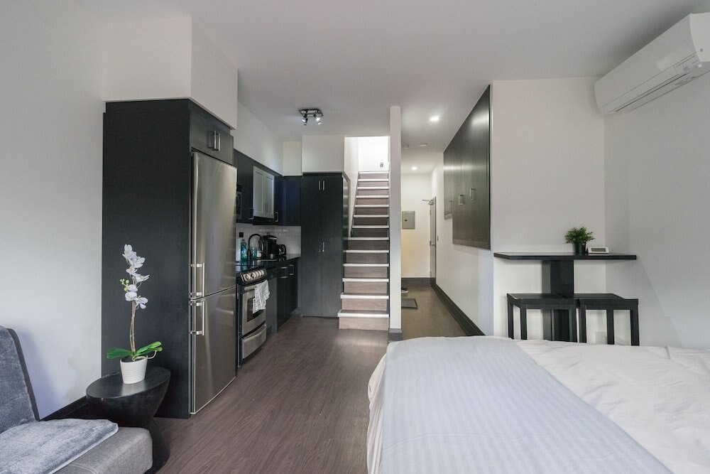 Applewood Suites - Queen West Studio - Tap to explore photos