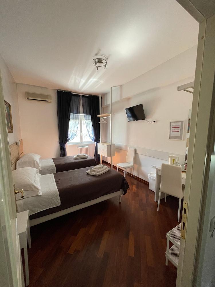 Garden of Rome Guesthouse - Tap to explore photos