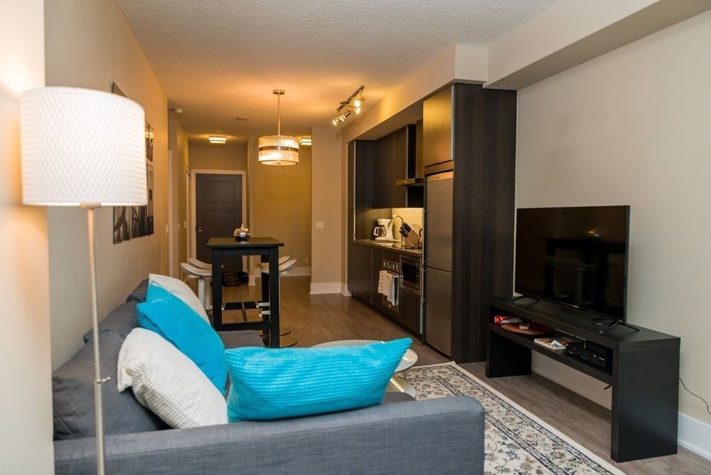 Sarkar Suites - CN Tower Rogers Centre - Tap to explore photos