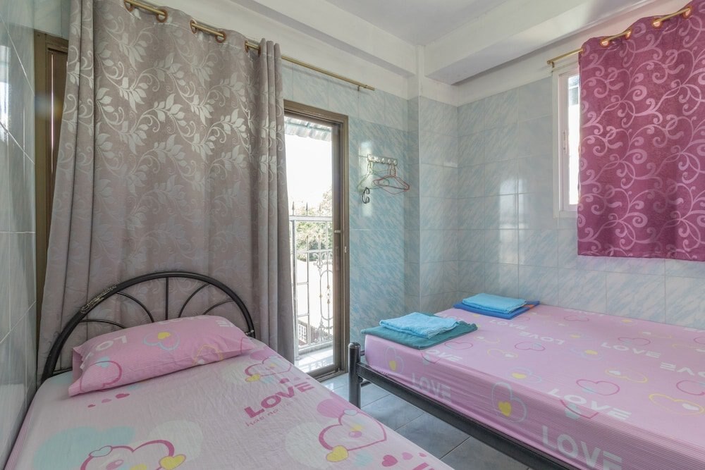 New Central Guesthouse Room Type - Standard Triple Room with Private Bathroom New Central Guesthouse Room Type - Standard Triple Room with Private Bathroom