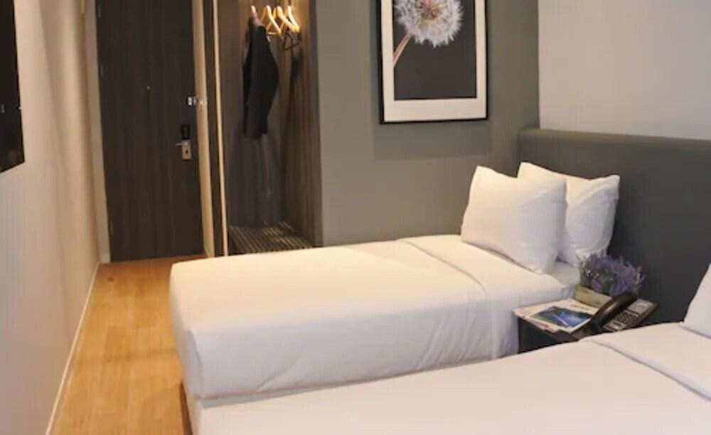 Juno Tanah Abang Jakarta Room Type - Deluxe Twin Room