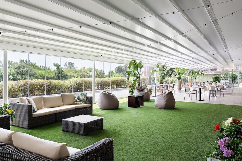 Courtyard by Marriott Rome Central Park - Tap to explore photos
