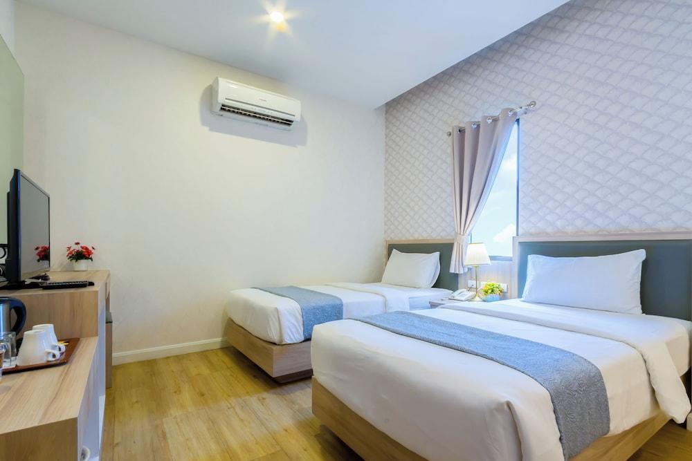 Leela Orchid Hotel Room Type - Deluxe Twin Room