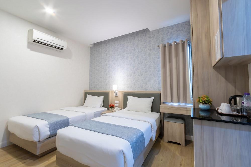 Leela Orchid Hotel Room Type - Superior Twin Room